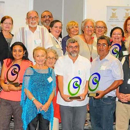 Group of representatives and award recipients during the Miranda Foundation Solidarity Award ceremony, including Ciudadanos del Karso.